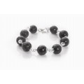 LBR11: BRACCIALE ARTIGIANALE RIGIDO IN ARGENTO 925 CON DISCO IN PIETRA LAVICA